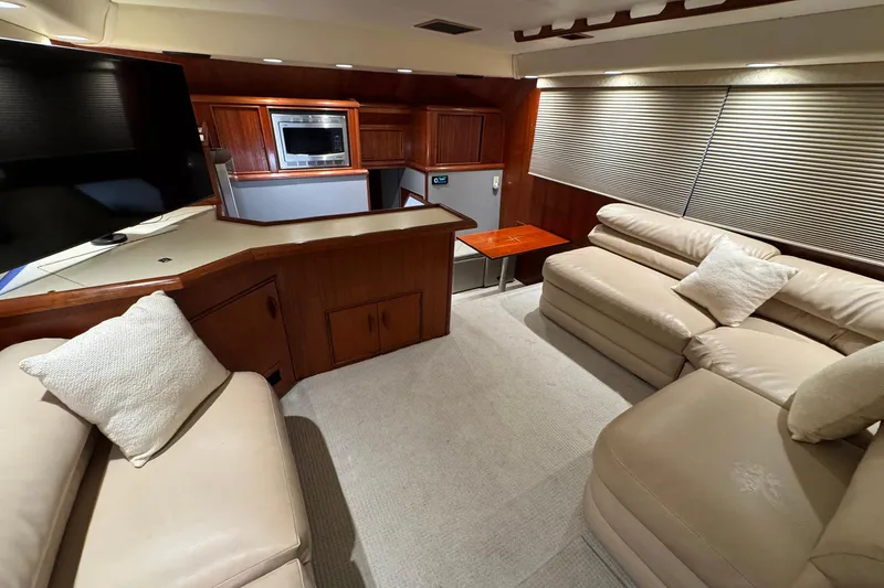 Slide: The Image of Luxurious interior of a 1988 Buddy Davis 47 Convertible yacht with leather seating and modern amenities. - 18