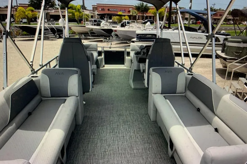 Slide: The Image of 2025 Avalon 2585 Venture Quad Lounge, high-performance pontoon boat interior with spacious seating. - 4