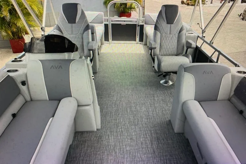 Slide: The Image of 2025 Avalon 2585 Venture boat interior with quad lounge seating and modern design. - 7