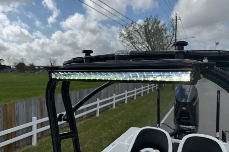 Slide: The Image of 2025 Shallow Sport boat with LED light bar on a sunny day. - 20