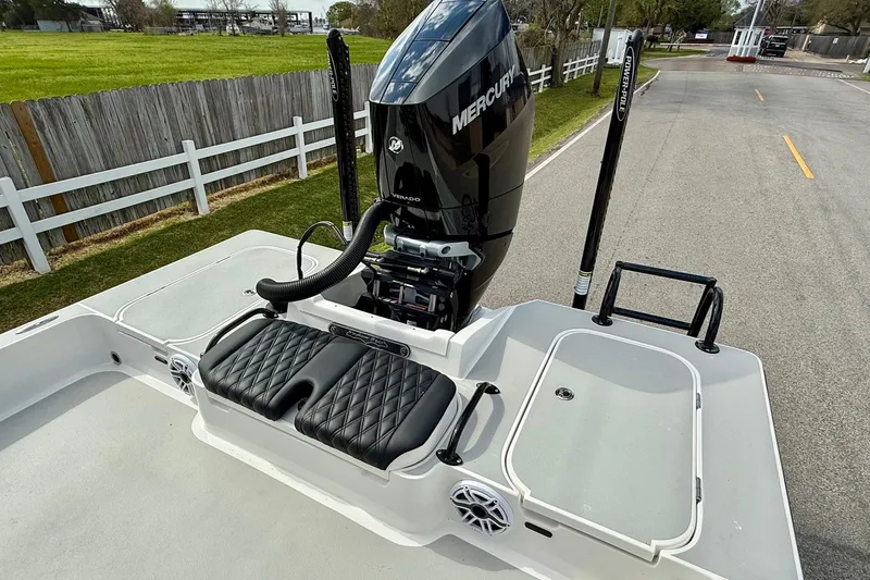 Slide: The Image of 2025 Shallow Sport boat with Mercury engine, featuring sleek seating and storage compartments. - 7