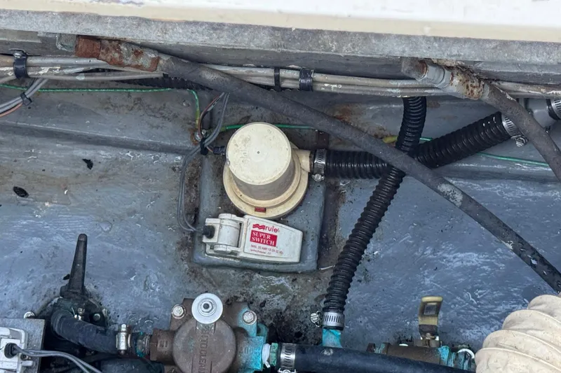 Slide: The Image of Bilge area of a 1979 Bertram 38 Convertible with Rule Super Switch. - 36