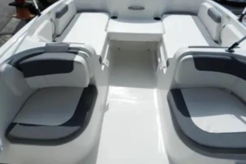 Slide: The Image of 2026 Bayliner Element E18 boat interior with spacious seating and modern design. - 12