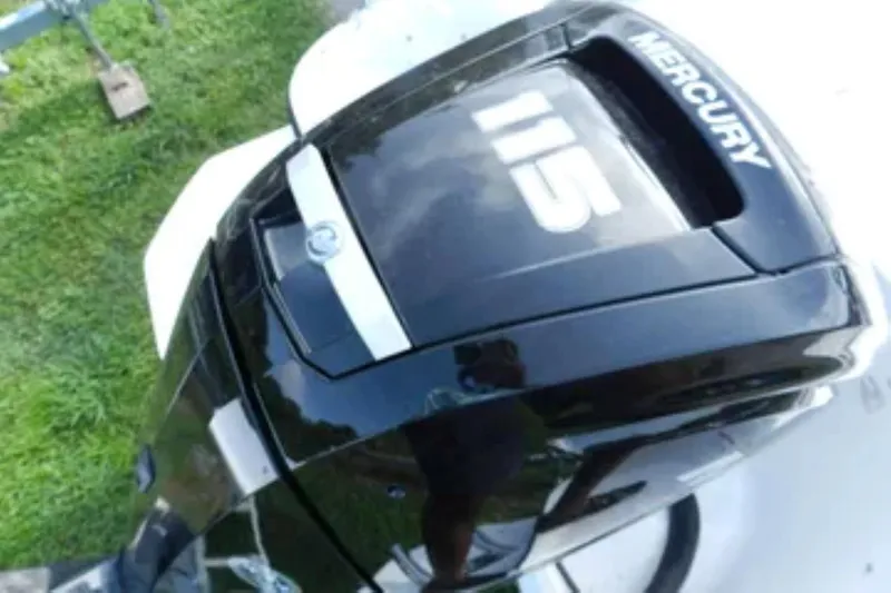 Slide: The Image of Mercury 115 outboard motor on 2026 Bayliner Element E18 boat, viewed from above. - 19