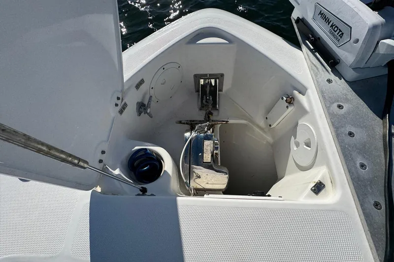Slide: The Image of Anchor compartment of 2008 Everglades 350 Center Console boat, featuring Minn Kota equipment. - 15