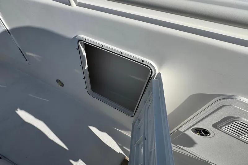 Slide: The Image of Open hatch on 2008 Everglades 350 Center Console boat deck. - 21