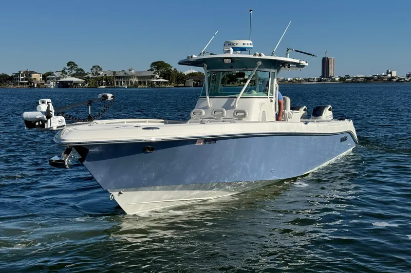 Slide: The Image of 2008 Everglades 350 Center Console boat cruising on a sunny day. - 4