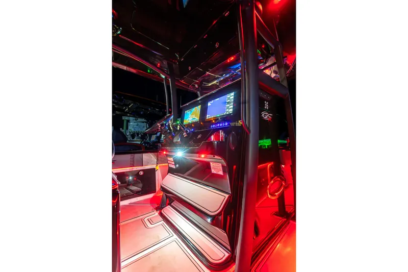 Slide: The Image of 2025 Glasstream 36 boat interior with illuminated dashboard and modern controls. - 21