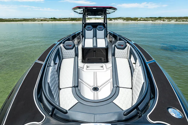 Slide: The Image of 2025 Glasstream 36 boat with luxurious seating on calm water. - 5