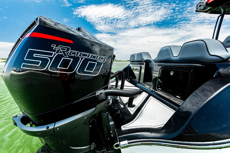 Slide: The Image of 2025 Glasstream 36 boat with Racing 500 engine, sleek design on water. - 9