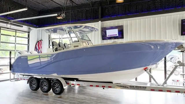 Slide: The Image of 2026 Sea Fox Commander 328 boat on trailer in showroom. - 48