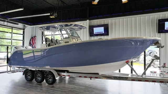 Slide: The Image of 2026 Sea Fox Commander 328 boat on trailer in showroom. - 49