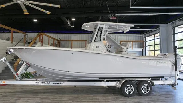 Slide: The Image of 2026 Tidewater LXF 272 boat on trailer in showroom. - 38