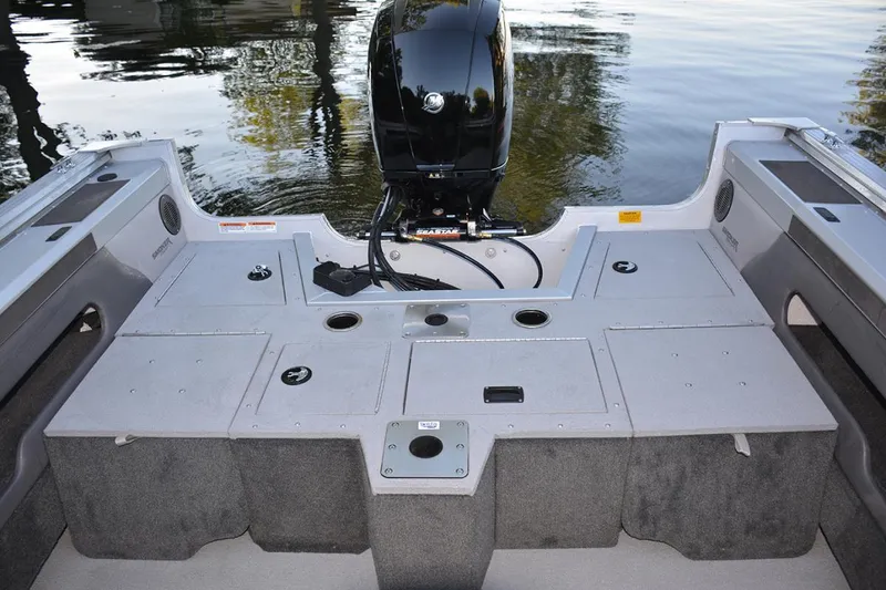 Slide: The Image of Manufacturer Provided Image: 2022 Smoker Craft Ultima 182 boat stern with outboard motor on calm water. - 10