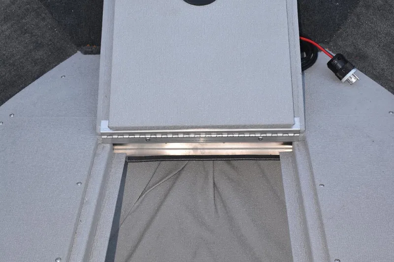 Slide: The Image of Manufacturer Provided Image: 2022 Smoker Craft Ultima 182 storage compartment with lid open. - 18