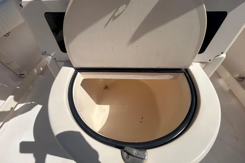 Slide: The Image of Open storage compartment on 2006 Grady-White Fisherman 222 boat. - 10