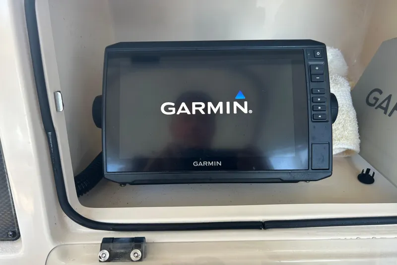 Slide: The Image of Garmin GPS device on 2006 Grady-White Fisherman 222 boat dashboard. - 15