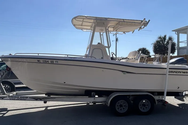 Slide: The Image of 2006 Grady-White Fisherman 222 boat on trailer, side view, sunny day. - 2