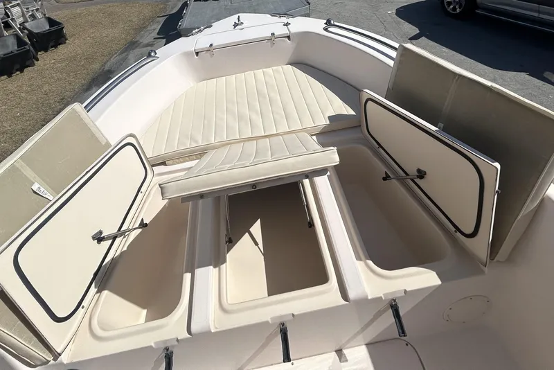 Slide: The Image of 2006 Grady-White Fisherman 222 boat interior with open storage compartments. - 25