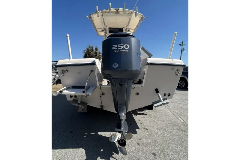 Slide: The Image of 2006 Grady-White Fisherman 222 boat with 250 horsepower outboard motor, rear view. - 4