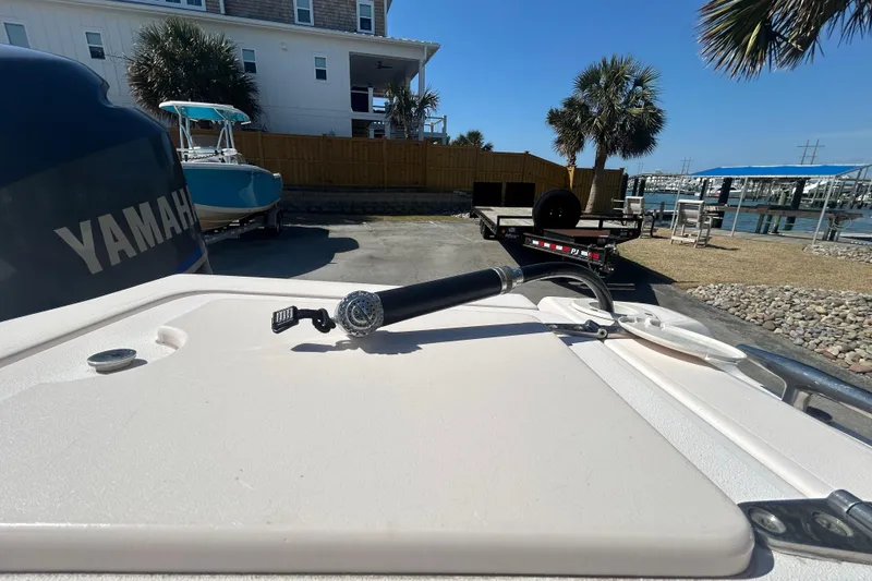 Slide: The Image of 2006 Grady-White Fisherman 222 boat with Yamaha engine, docked near waterfront. - 6