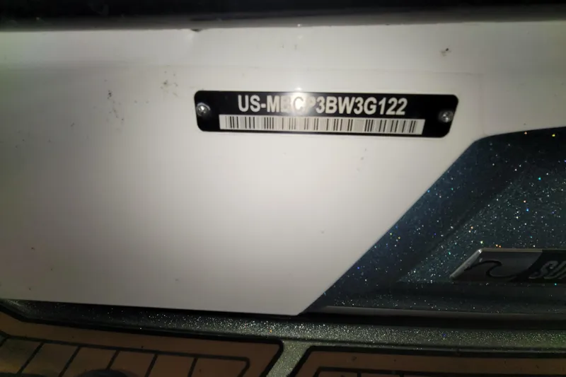 Slide: The Image of 2022 MasterCraft XStar S boat with visible hull identification number. - 16