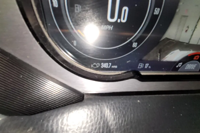 Slide: The Image of Close-up of 2022 MasterCraft XStar S dashboard showing 340.7 hours and 17% fuel. - 22