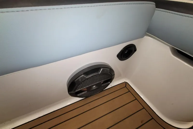 Slide: The Image of Interior of 2022 MasterCraft XStar S boat with speaker and teak flooring. - 25