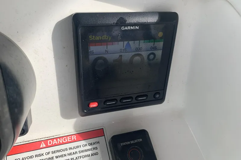 Slide: The Image of Garmin display on 2018 Everglades 355 Center Console boat, showing navigation data. - 21