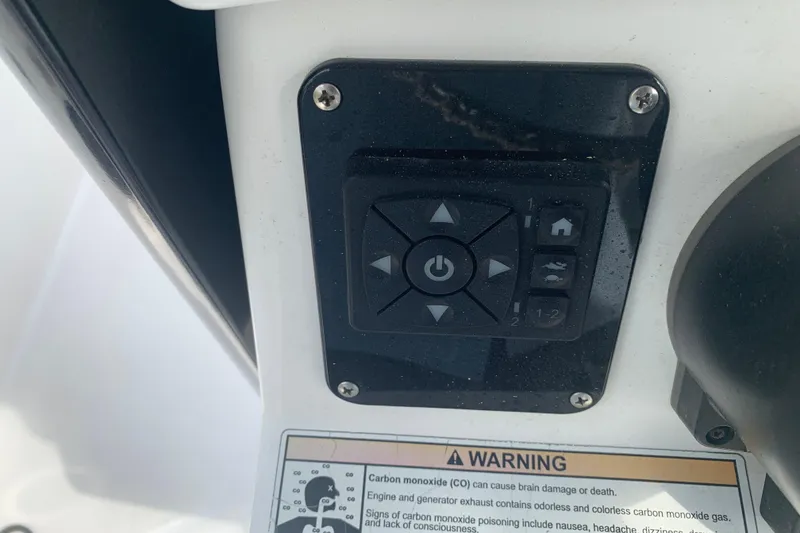 Slide: The Image of Control panel on 2018 Everglades 355 Center Console boat with warning label. - 22