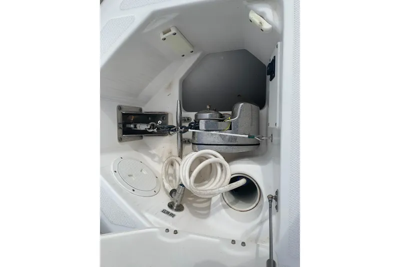 Slide: The Image of 2018 Everglades 355 Center Console anchor locker with winch and rope storage. - 27