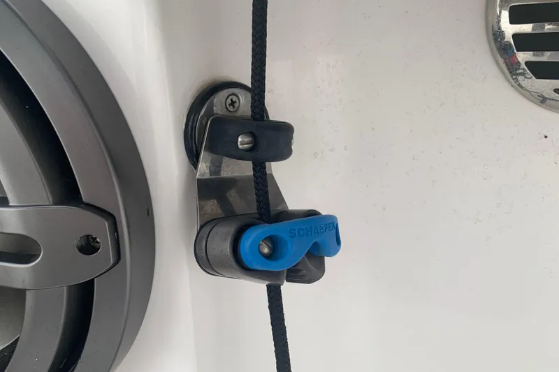 Slide: The Image of Close-up of a Schaefer rope cleat on a 2018 Everglades 355 Center Console boat. - 31