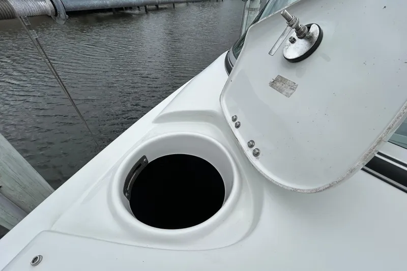 Slide: The Image of 2022 Crownline 270 XSS boat interior seating with speaker detail. - 101