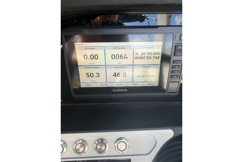 Slide: The Image of Garmin GPS display on 2022 Crownline 270 XSS showing speed and coordinates. - 11