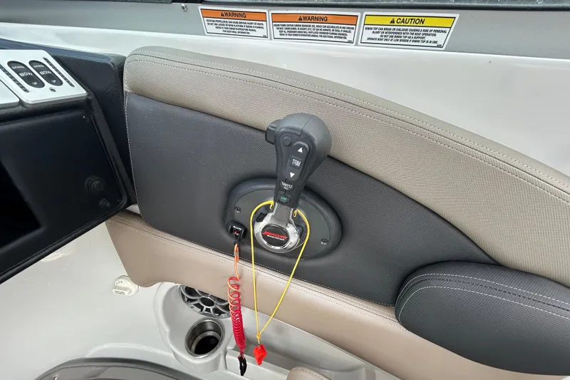 Slide: The Image of 2022 Crownline 270 XSS boat interior with sleek seating and modern design. - 27