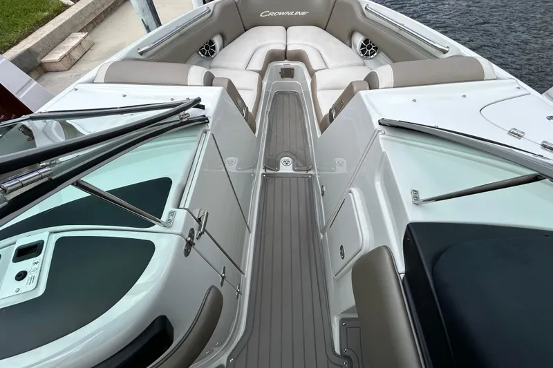 Slide: The Image of 2022 Crownline 270 XSS boat interior with luxurious seating and elegant design. - 31