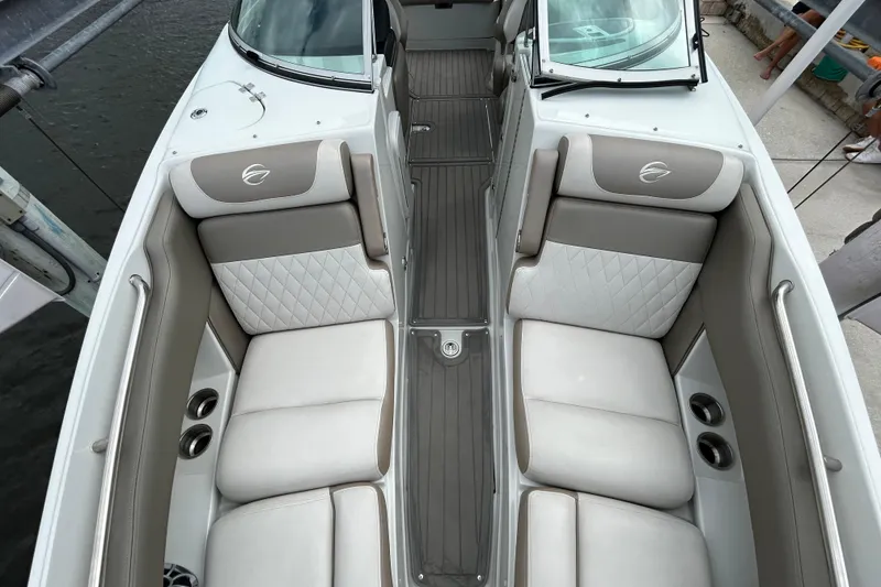 Slide: The Image of Interior of 2022 Crownline 270 XSS boat with luxurious seating and modern design. - 37