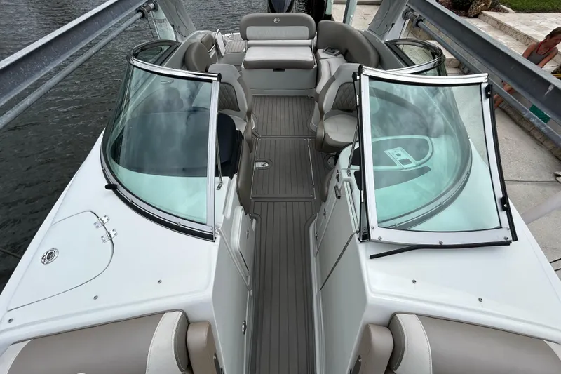 Slide: The Image of 2022 Crownline 270 XSS boat interior with luxurious seating and modern design. - 39