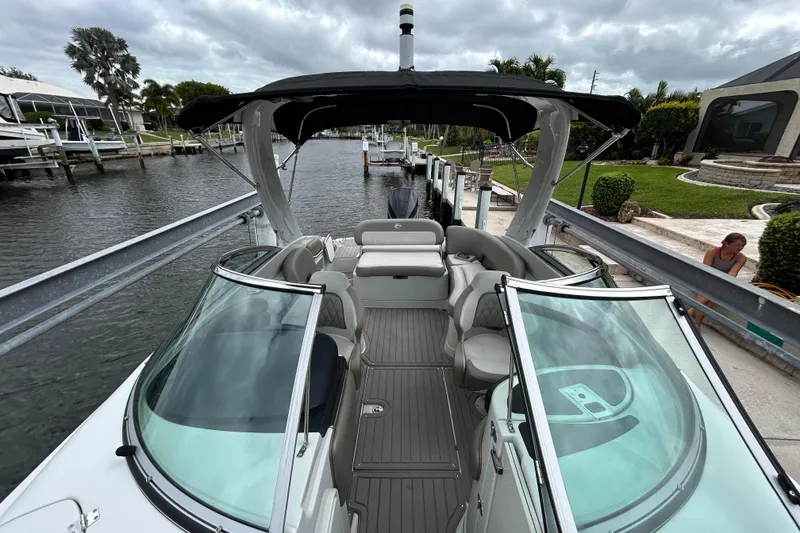 Slide: The Image of 2022 Crownline 270 XSS boat interior with luxurious seating and elegant design. - 40