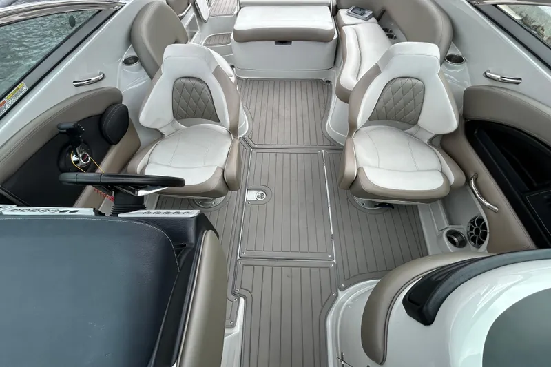 Slide: The Image of 2022 Crownline 270 XSS boat interior with spacious seating and modern design. - 41