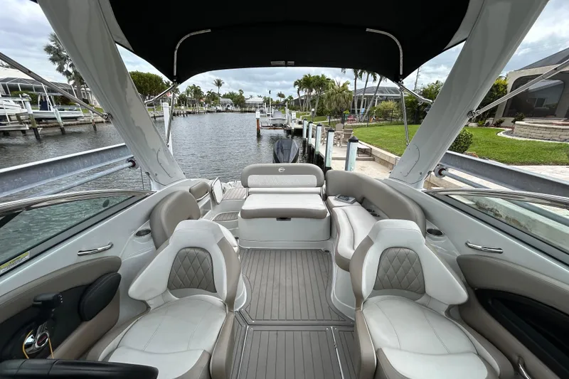 Slide: The Image of 2022 Crownline 270 XSS boat interior with luxurious seating and sleek design. - 42