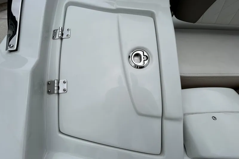 Slide: The Image of 2022 Crownline 270 XSS boat hatch with stainless steel hinges and latch. - 51
