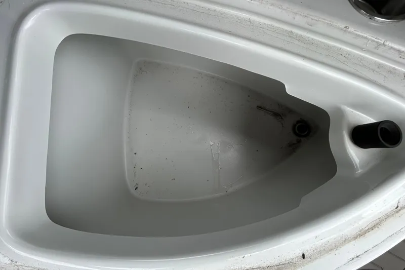 Slide: The Image of 2022 Crownline 270 XSS boat sink with drain and faucet. - 61
