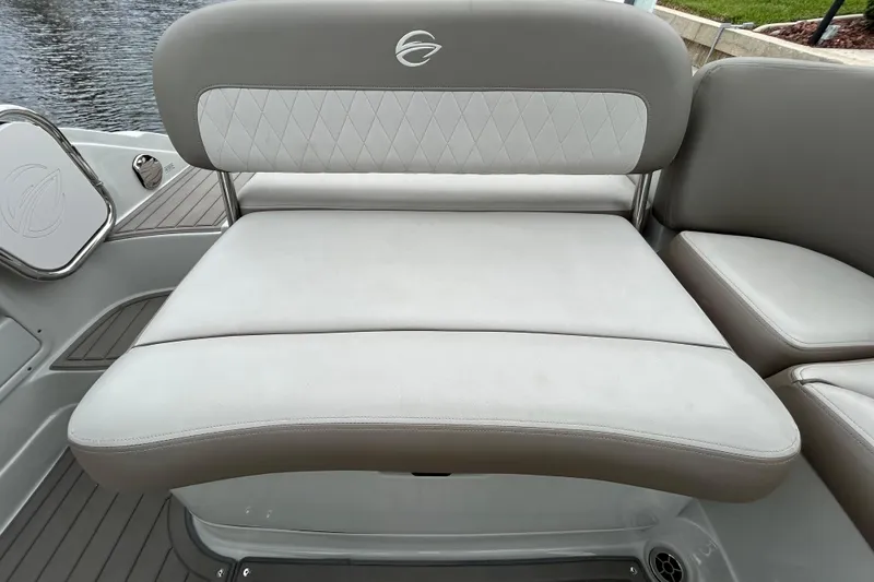 Slide: The Image of 2022 Crownline 270 XSS boat seating with elegant upholstery and logo detailing. - 62