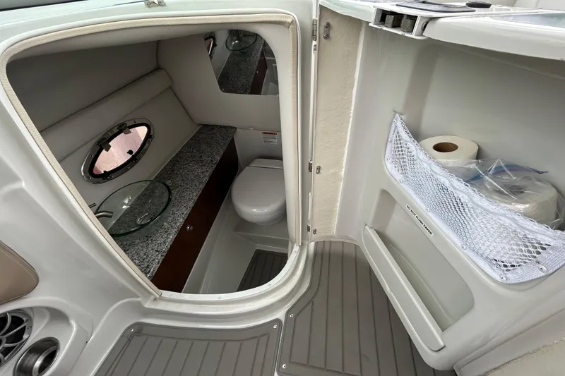 Slide: The Image of Interior detail of 2022 Crownline 270 XSS boat, featuring sleek design and modern finishes. - 74