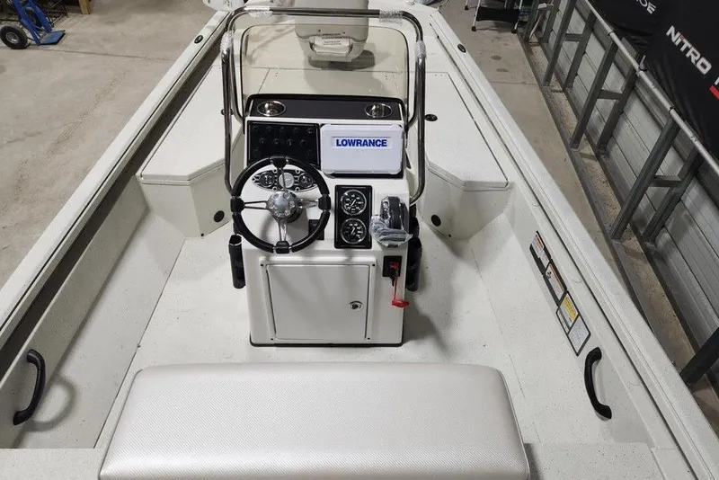 Slide: The Image of 2026 Ranger RB190 boat interior with steering console and Lowrance equipment. - 4