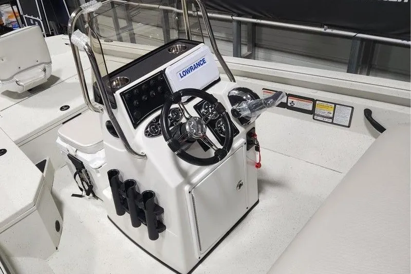 Slide: The Image of 2026 Ranger RB190 boat console with steering wheel and Lowrance electronics. - 6