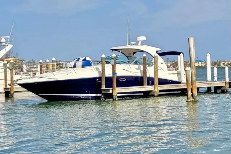 Slide: The Image of 2005 Sea Ray 390 Sundancer yacht docked at marina on a sunny day. - 4