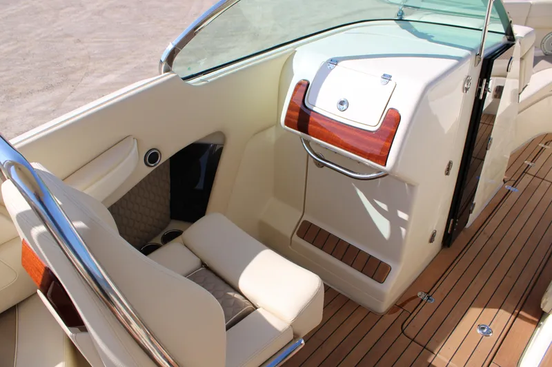 Slide: The Image of 2025 Chris Craft Launch 28 GT interior with elegant seating and wood accents. - 11