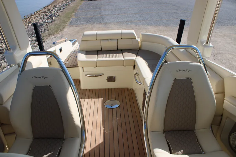 Slide: The Image of 2025 Chris Craft Launch 28 GT interior with luxurious seating and teak flooring. - 14